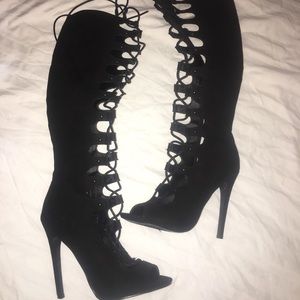 Over the knee lace up boots